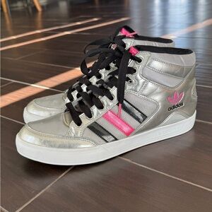 Rare Adidas Originals women’s mid-top lifestyle sneakers with a silver/metallic